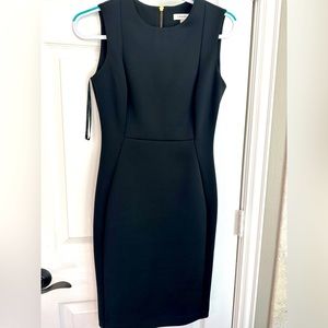 Go to work in STYLE! Calvin Klein midi dress. Never worn!